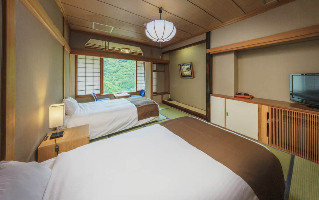 Japanese room with a stream view and two beds